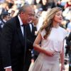 Fawaz Gruosi et Amber Heard à la montée des marches du film "Deux jours, une nuit" lors du 67 ème Festival du film de Cannes le 20 mai 2014.