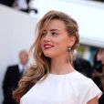 Amber Heard, la surprise, sur le tapis rouge du 67e Festival de Cannes le 20 mai 2014.