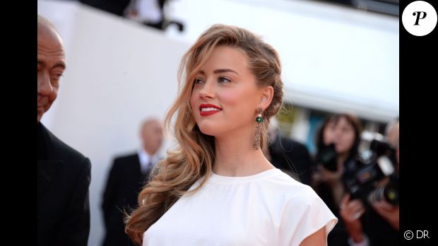 Amber Heard, la surprise, sur le tapis rouge du 67e Festival de Cannes le 20 mai 2014.