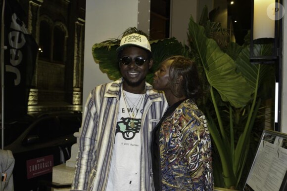 Fatou Diallo et Theophilus London au dîner organisé par Sandra Zeitoun-de Matteis, au Five Seas Hotel de Cannes, en l'honneur du site Viderdressing, le 21 mai 2014.