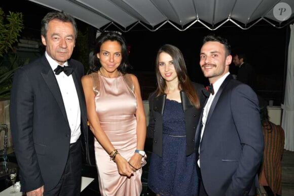 Michel Denisot, Jérome Niel et Heloïse la pianiste concertiste au dîner organisé par Sandra Zeitoun-de Matteis, au Five Seas Hotel de Cannes, en l'honneur du site Viderdressing, le 21 mai 2014.