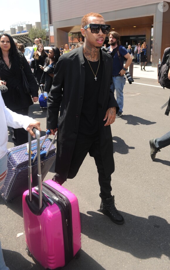 Le rappeur Tyga arrive à Florence pour assister au mariage de Kanye West et Kim Kardashian. Le 24 mai 2014.