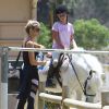 Exclusif - Denise Richards accompagne ses filles à leur cours d'équitation à Los Angeles, le 25 mai 2014. 