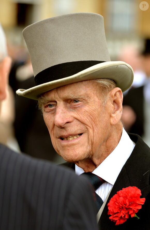 Le duc d'Edimbourg. Deuxième garden party de l'année à Buckingham, le 28 mai 2014, en l'honneur de la Household Cavalry.