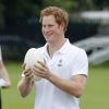 Le prince Harry a joué au football et au rugby avec des enfants défavorisés d'Ipswich, dans le Suffolk, le 29 mai 2014