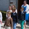 Les princes Nicolas et Aymeric de Belgique lors de leur première communion le 29 mai 2014 à l'église Sainte-Catherine de Bonlez.