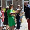 Le prince Laurent et la princesse Claire de Belgique avec leurs fils les jumeaux Nicolas et Aymeric lors de leur première communion le 29 mai 2014 à l'église Sainte-Catherine de Bonlez.