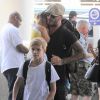 David Beckham et sa femme Victoria en compagnie de leurs enfants à l'aéroport à Los Angeles Le 31 mai 2014.