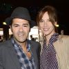 Jamel Debbouze et sa femme Mélissa Theuriau, capillairement métamorphosée, lors de la finale du Trophée d'Impro inter-collèges au Comedia, à Paris, le 19 mai 2014