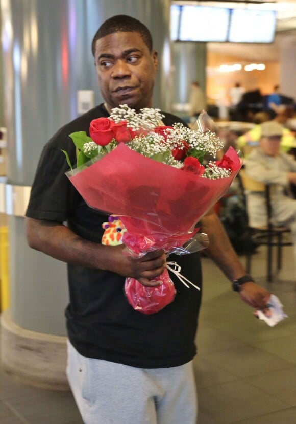 Tracy Morgan et sa petite amie Megan Wollover en compagnie de leur fille Maven à l'aéroport à Vancouver, le 30 mai 2014.