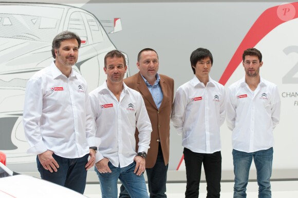 Yves Maton le patron de Citroën Sport entouré de ses pilotes Yvan Muller, Sébastien Loeb, Ma Qinq Hua et Jose Maria Lopes lors du Geneva Motor Show de Genève le 4 mars 2014