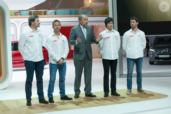 Frederic Banzet le patron de Citroën entouré des pilotes Yvan Muller, Sébastien Loeb, Ma Qinq Hua et Jose Maria Lopes lors du Geneva Motor Show de Genève le 4 mars 2014
