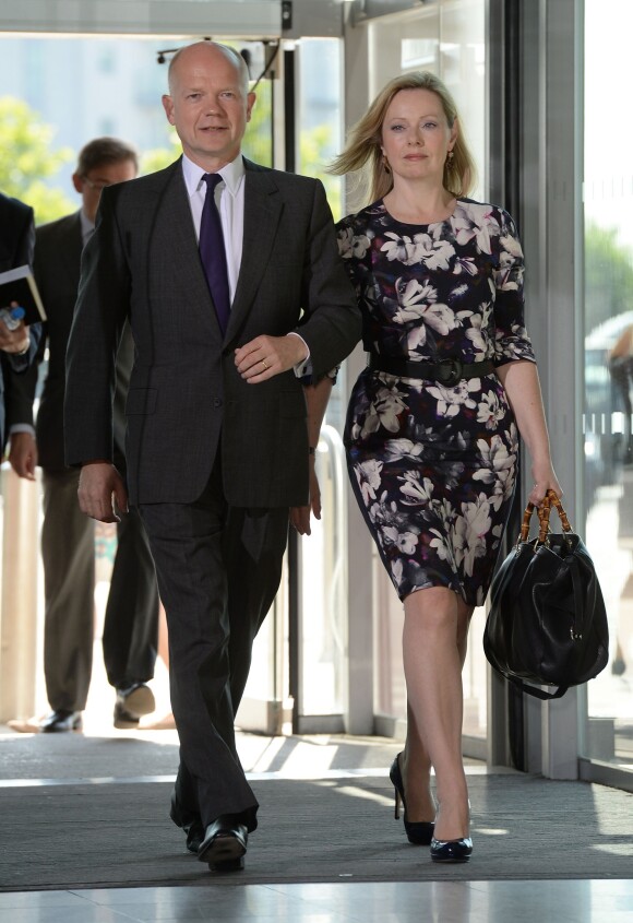 William Hague et sa compagne au Global Summit To End Sexual Violence In Conflict à Londres le 13 juin 2014.