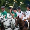Le prince William et le prince Harry disputaient le 15 juin 2014 le Jerudong Trophy au polo club de Cirencester Park, près de Londres, sous le regard de Kate Middleton et du prince George