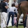 Le prince George de Cambridge et Kate Middleton étaient dimanche 15 juin 2014 au Cirencester Polo Club, près de Londres, pour regarder le prince William et le prince Harry se disputer le Jerudong Trophy