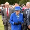 La reine Elizabeth II et le duc d'Edimbourg assistaient le 15 juin 2014 à la Cartier Queens Cup au club de polo de Windsor.