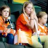 Soupe à la grimace... Le roi Willem-Alexander, la reine Maxima des Pays-Bas et leurs filles Catharina-Amalia, Alexia et Ariane ont assisté le 15 juin 2014 à la finale de la Coupe du monde de hockey sur gazon entre les Pays-Bas et l'Australie. L'Australie l'a emporté 6 à 1.