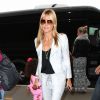 Heidi Klum et ses enfants prennent un vol à l'aéroport de Los Angeles, à destination de New York. Le 13 juin 2014.