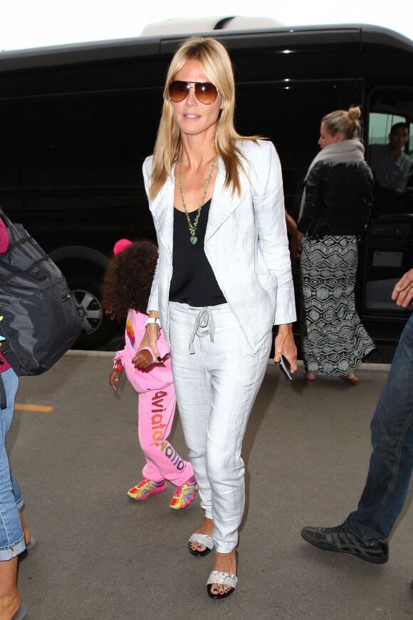 Heidi Klum et ses enfants prennent un vol à l'aéroport de Los Angeles, à destination de New York. Le 13 juin 2014.