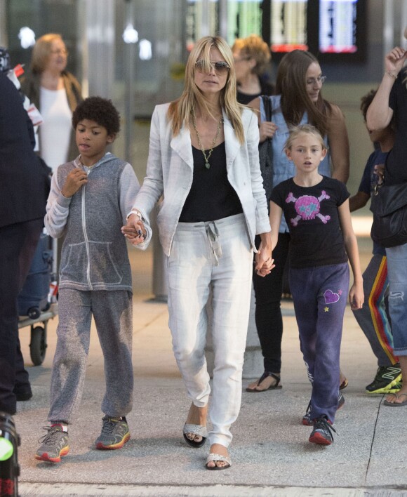 Heidi Klum et ses enfants Leni, Johan, Henry et Lou arrivent à l'aéroport JFK, à New York. Le 13 juin 2014.
