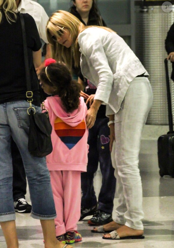 Heidi Klum et ses enfants Leni, Henri, Johan et Lou arrivent à l'aéroport de New York. Le 13 juin 2014.
