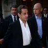 Nicolas Sarkozy quitte son hôtel à Barcelone, le 19 juin 2014. Carla donnait le dernier concert de sa tournée dans les jardins du Palau Reial de Pedralbes dans le cadre d'un festival.