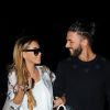 La belle Nabilla Benattia et son compagnon Thomas Vergara se promènent à Cannes à l'occasion du festival du film le 18 mai 2014