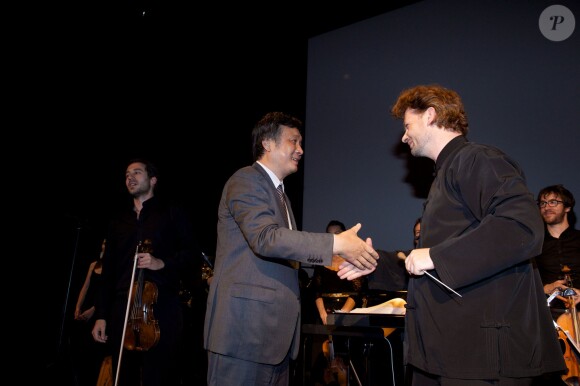 Exclusif - Zou Ye et le chef d'orchestre Paul-Emmanuel Thomas - Présentation de la version remasterisée du film "La Divine" à la Cinémathèque française à Paris, le 24 juin 2014.