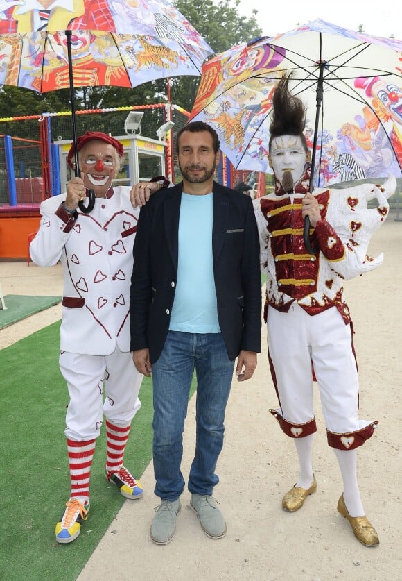 Zinedine Soualem participe à l'ouverture de la fête des Tuileries 2014 à Paris, le 27 juin 2014.