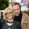 Nicoletta et son mari Jean-Christophe participent à l'ouverture de la fête des Tuileries 2014 à Paris, le 27 juin 2014.