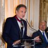 Didier Reynders (Vice-Premier Ministre et Ministre des Affaires étrangères), Michel Drucker - Michel Drucker élevé au rang de commandeur de l'Ordre de la Couronne lors d'une cérémonie qui a eu lieu au palais d'Egmont à Bruxelles le 27 juin 2014 27/06/2014 - Bruxelles