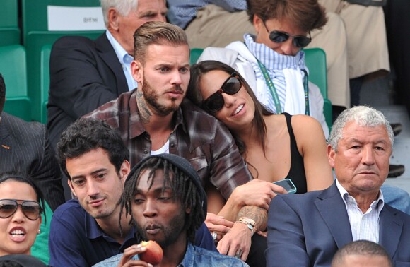 M. Pokora et Scarlett Baya dans les tribunes de Roland Garros. Paris, le 2 juin 2014.