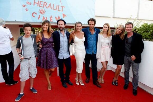 Axel Bachy, Julie De Bona, Arnaud Sadowski, Marion Dumas, Bartholomew Boutellis, Aude Auffret, Jessica Morali et Dominic Bachy à la première du film "Le Jeu de la vérité" lors de la cérémonie de clôture du 11ème festival "Les Hérault du cinéma et de la télé 2014" au Cap d'Agde, le 5 juillet 2014.