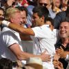 Novak Djokovic dans les bras de Boris Becker après sa victoire en finale de Wimbledon, face à Roger Federer, le 6 juillet 2014 à Londres