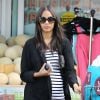 Zoe Saldana toute en rondeurs fait ses courses à Studio City, le 14 juillet 2014. 