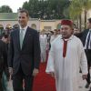 Le roi Felipe VI d'Espagne et le roi Mohammed VI du Maroc arrivent pour l'iftar donné au palais royal, à Rabat, le 14 juillet 2014, en l'honneur de la visite inaugurale du couple royal espagnol.