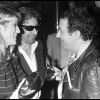 Sheila, Serge Gainsbourg et Coluche à Paris, décembre 1981. 