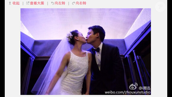 Photo du mariage de Zhou Xun et Archie Kao lors d'un gala de charité à Hangzhou (Chine) le 16 juillet 2014 postée sur le réseau social Weibo.  