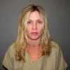 Amy Locane-Bovenizer arrêtée en 2010 dans le New Jersey pour avoir causé la mort d'une femme dans un accident de voiture alors qu'elle roulait ivre.