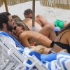 Natasha Oakley et son petit ami Martin Médus (Secret Story 3) tendres et complices lors de leurs vacances à Miami, le 16 juillet 2014. 