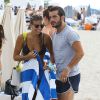 Natasha Oakley et son petit ami Martin Médus (Secret Story 3) profitent de la plage à Miami, le 15 juillet 2014. 