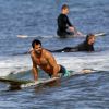 Exclusif - David Charvet donne des cours de surf à sa fille Heaven à Malibu, le 12 juillet 2014