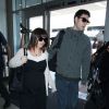 Christina Ricci (enceinte) et son compagnon James Heerdegen arrivent à l'aéroport LAX de Los Angeles. Le 27 mai 2014.