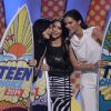 From left, Kylie Jenner, Kim Kardashian and Kendall Jenner accept the award for Choice TV: Reality Show for "Keeping Up With The Kardashians" on stage at Teen Choice 2014 at the Shrine Auditorium on August 10, 2014 in Los Angeles, CA, USA. Photo by Phil McCarten/PictureGroup/ABACAPRESS.COM.11/08/2014 - Los Angeles