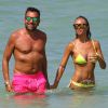Laura Cremaschi et son compagnon Andrea Perone profitent d'un bel après-midi sur une plage de Miami, le 14 août 2014.