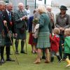 Le prince Charles et Camilla Parker Bowles en visite en Ecosse, où ils sont connus en tant que duc et duchesse de Rothesay, le 14 août 2014 pour les 150 ans des Highland Games à Ballater.