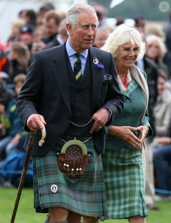 Le prince Charles et Camilla Parker Bowles en visite en Ecosse, où ils sont connus en tant que duc et duchesse de Rothesay, le 14 août 2014 pour les 150 ans des Highland Games à Ballater.