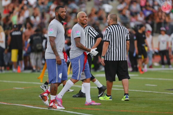 Chris Brown et The Game lors d'un match de flag flootball caritatif au Jack Kemp Stadium. Los Angeles, le 16 août 2014.