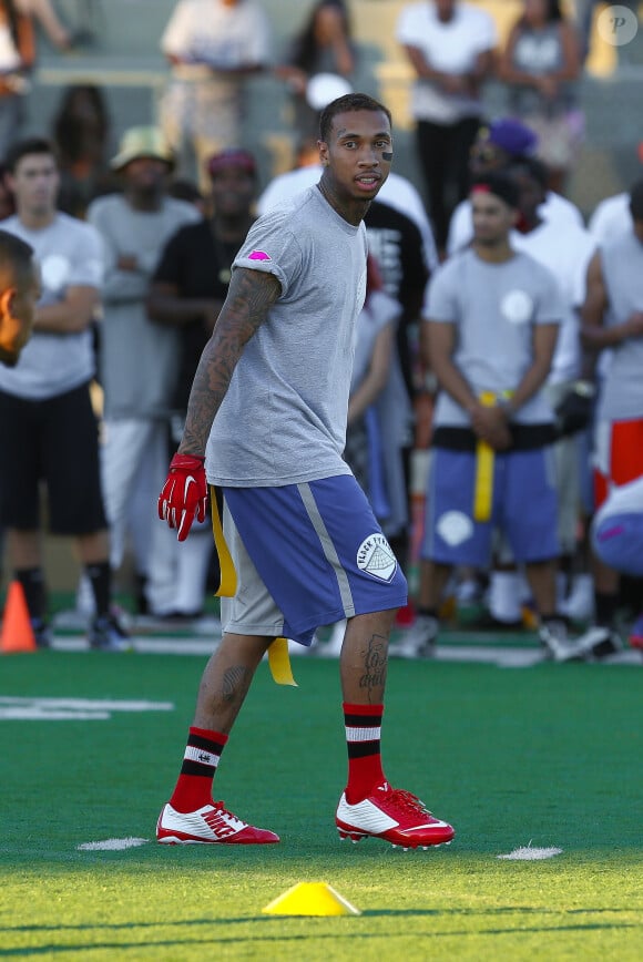 Tyga lors du match de flag football caritatif de Chris Brown et Quincy Combs au Jack Kemp Stadium. Los Angeles, le 16 août 2014.