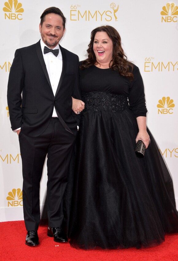 Ben Falcone et Melissa McCarthy lors des 66e Annual Primetime Emmy Awards au Nokia Theatre de Los Angeles, le 25 août 2014.